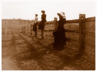 Wragge women on a post and rail fence. Picture taken probably in the fields that later became the Simpson Barracks, Yallambie. (Source: Bill Bush Collection)