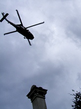 Army Black Hawk helicopters flying low over roof top chimneys of Yallambie Homestead, March, 2011 (McLachlan)