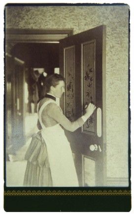 Sarah Annie Wragge decorating a door, c1890. (Source: Bill Bush Collection)