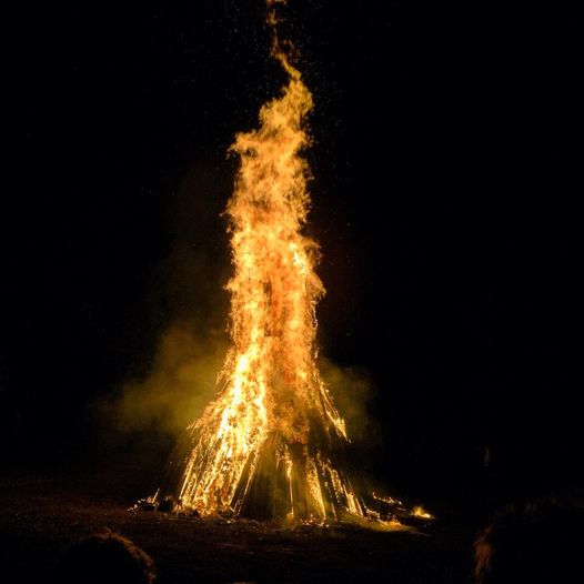 Large bonfire burning at night